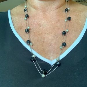 SILVER AND BLACKK BEAD DOUBLE STRAND NECKLACE. CAN BE WORN WITHJ EVERYTHING.